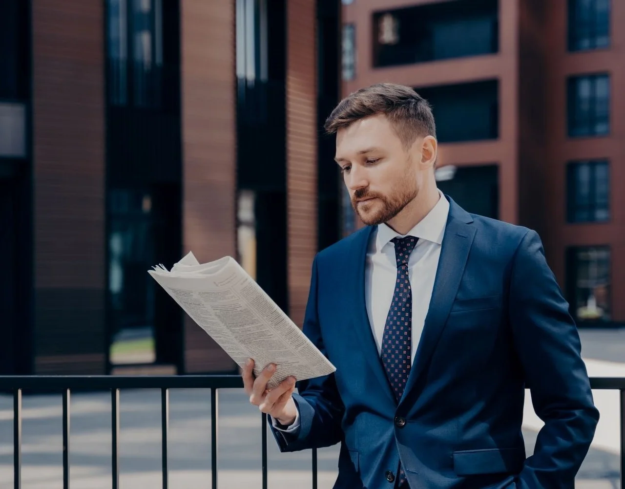 boss reading newspaper